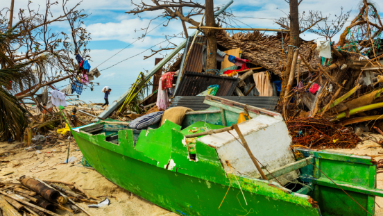 A fishing boat washed ashore following a typhoon.